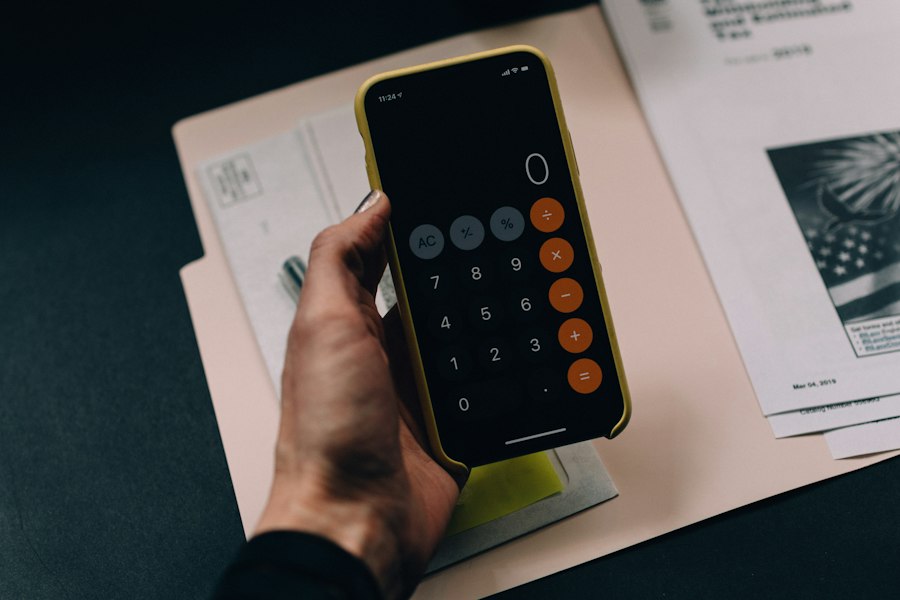 Hand holding a tax payment check